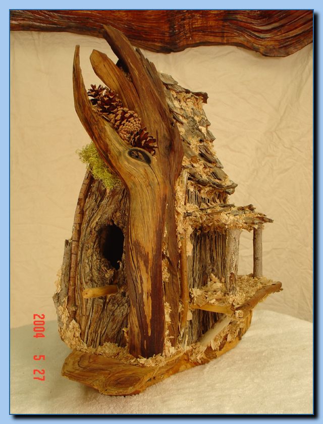 1-26 bird house with pine cones